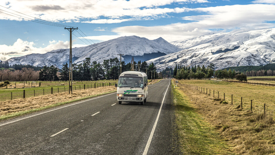 Bus at Eglington Valley, heading towards Milford Sound and Routeburn Track Divide end