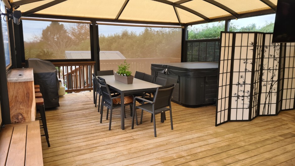 Shared open covered Deck area, Luxury hot Spa, BBQ and seating