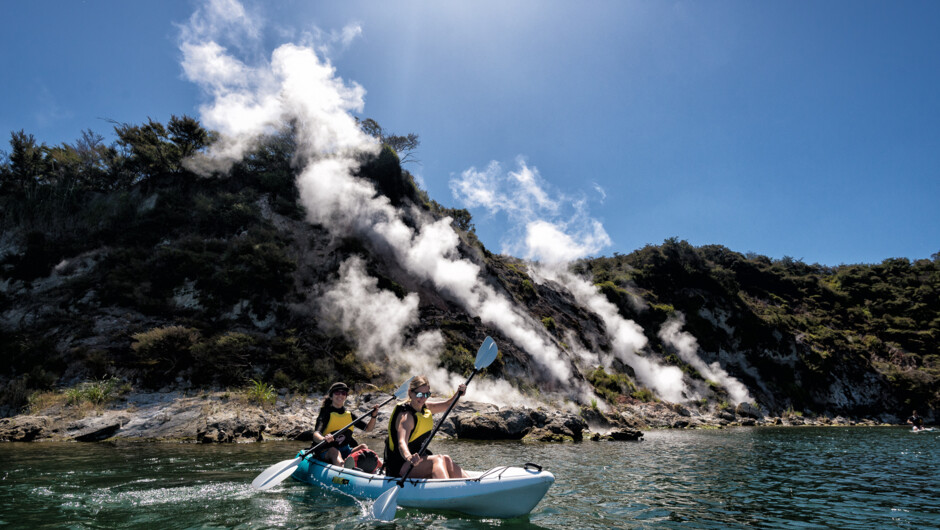 Friends kayak near geothermal wonder