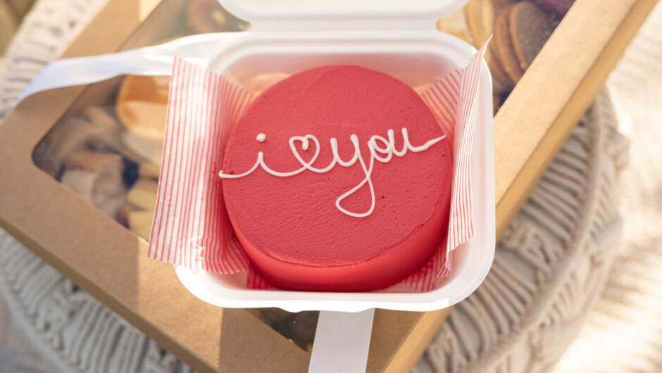 Each picnic includes a customizable small cake for two, perfect for celebrating your special moment.