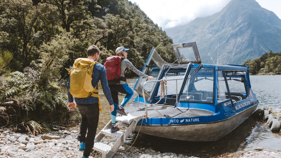 Hikers boarding the boat at Sandfly Point, end of the Milford Track