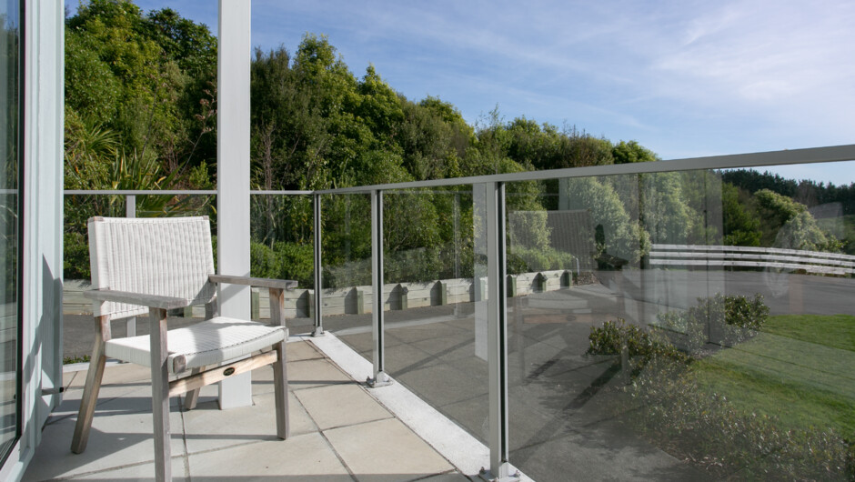 The guests outdoor patio looking towards our protected stream and a place to enjoy the sunsets.