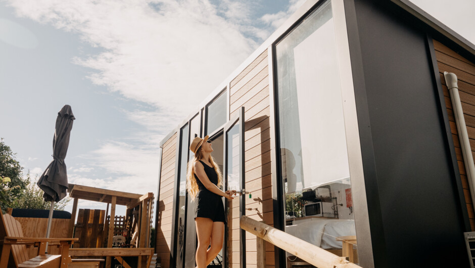 Unwind in the cosy embrace of our tiny house, where modern comfort meets nature's tranquility.