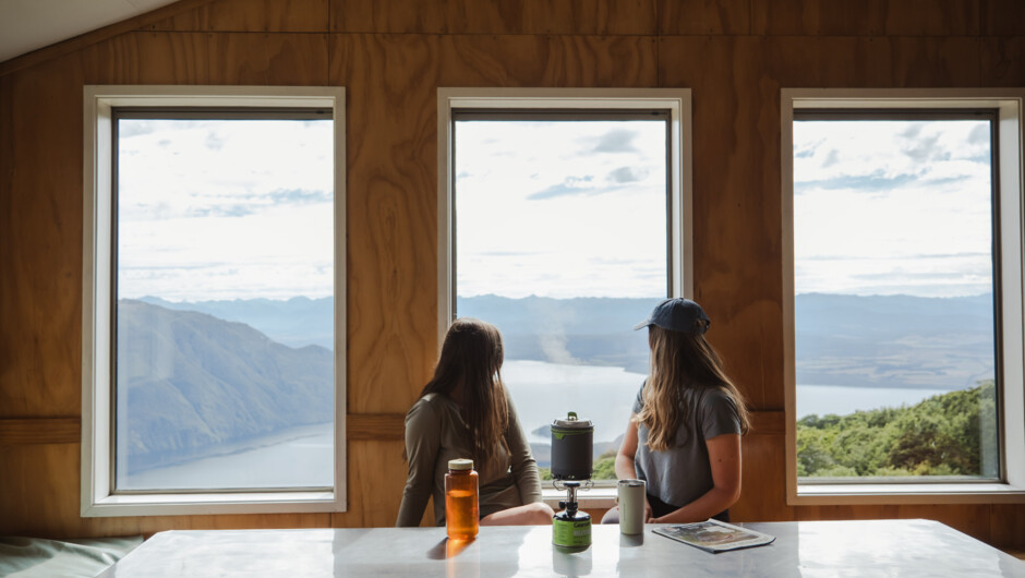 Having a cuppa at Luxmore Hut on a Kepler Track day walk before heading back down.