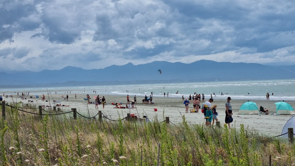 Tāhunanui beach on a hot summer day