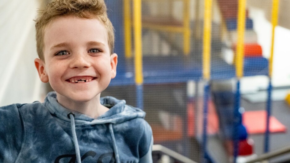 Boy playing in the kids play area