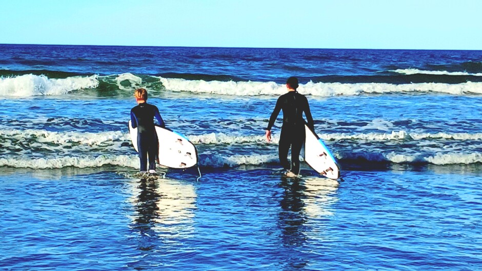 Teenagers surfing at South Brighton