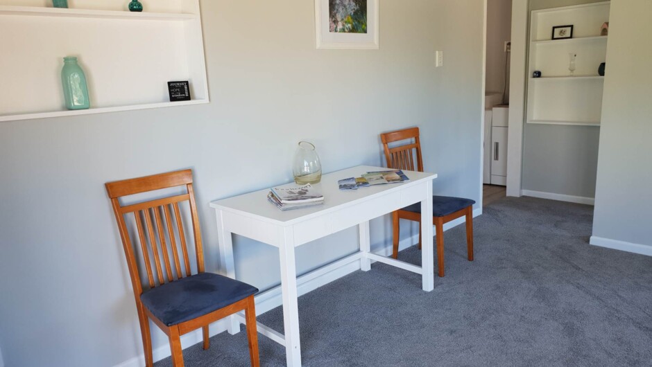 Desk/table & chairs in Lounge