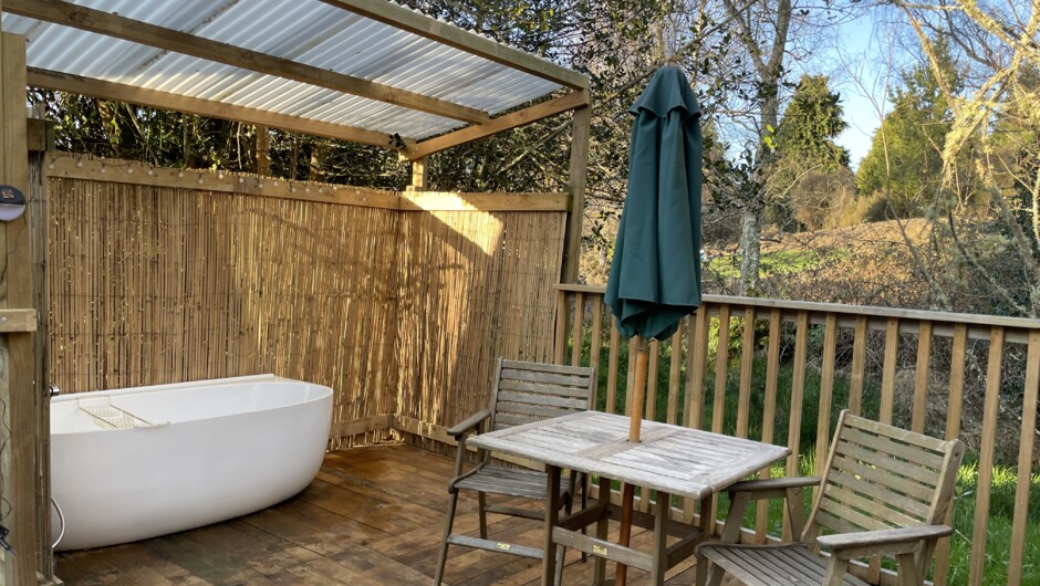 Outdoor bath and dinning area.