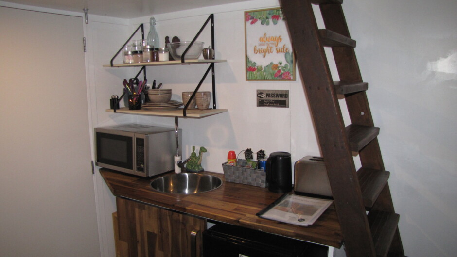 Kitchenette and ladder to the double bed where you will sleep