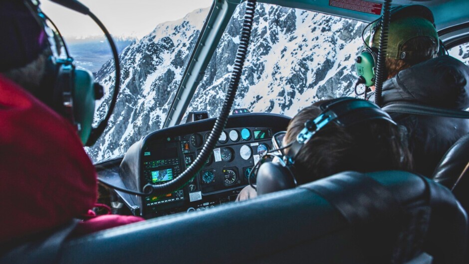 Capturing the majestic peaks of the West Coast, framed by stunning glacial landscapes.