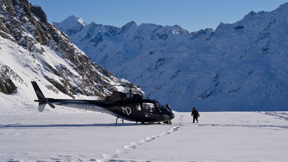 A moment to remember indulging in gourmet treats on the Tasman Glacier, with the Southern Alps as your stunning backdrop.