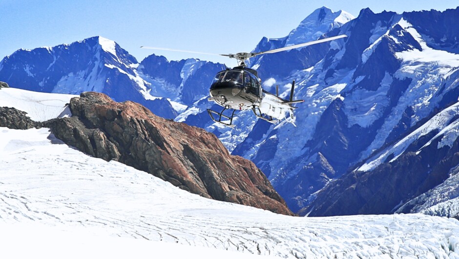 Experience the breathtaking beauty of the Southern Alps from above.