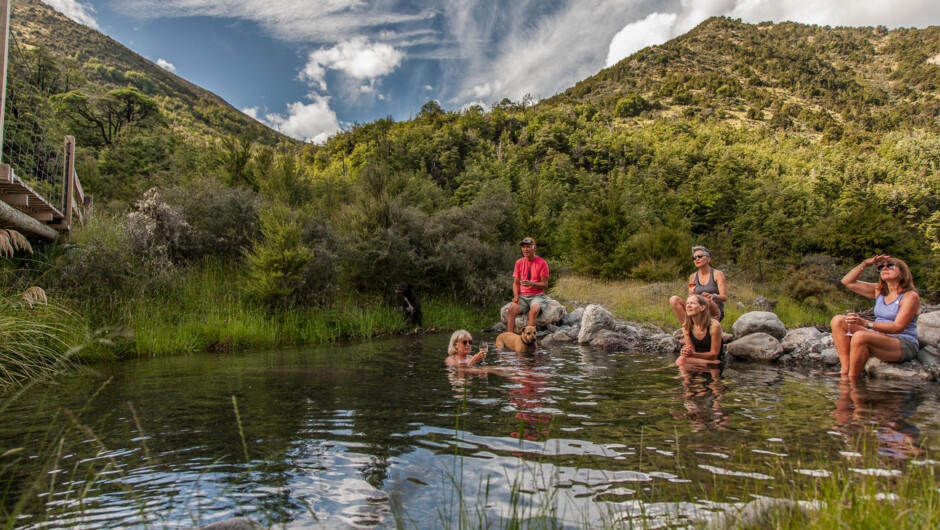 Enjoying a refreshing dip after hiking along remote trails