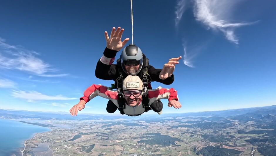 Soaring above Abel Tasman at 16,500ft. Who needs wings when you can jump?