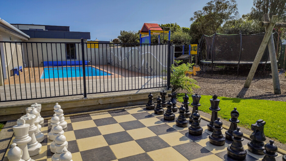 Chess set, swimming pool and playground