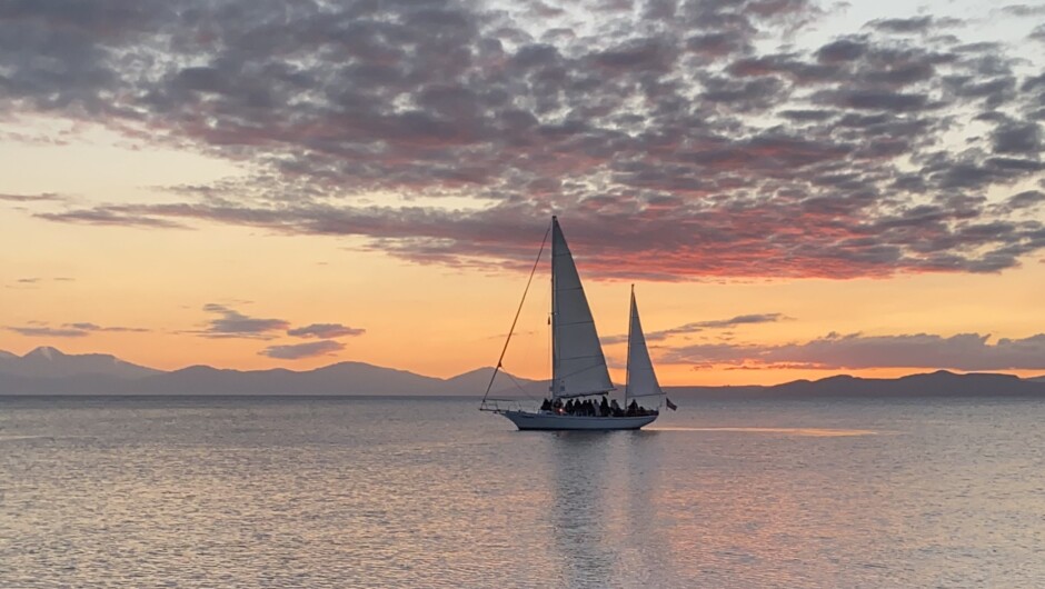 Sailing into a sunset