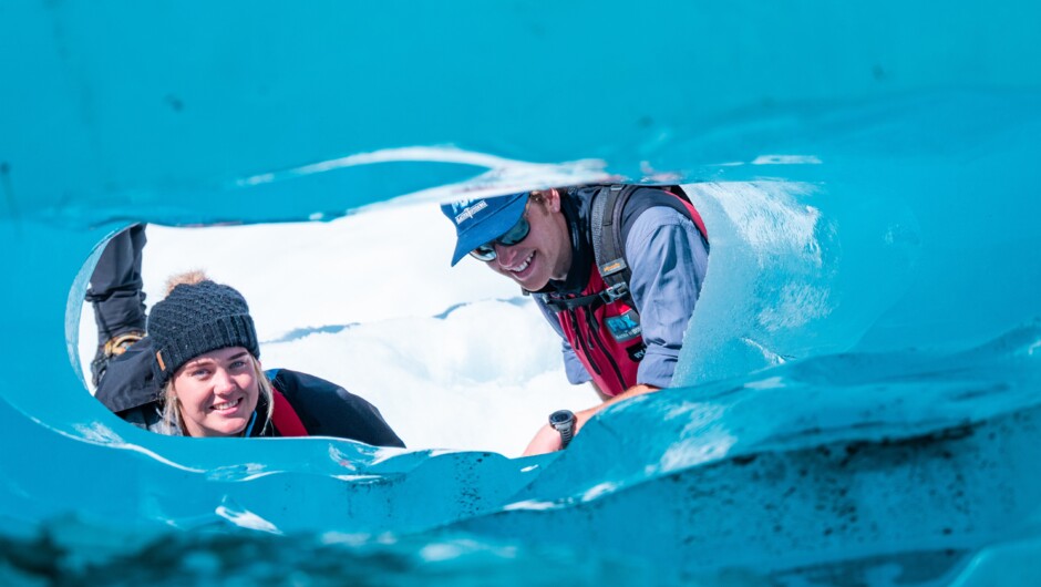 View the spectacular colours of the different ice features on the glacier.