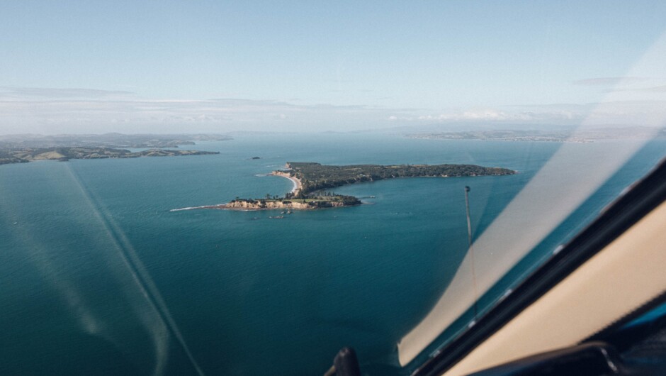 Sip, savour, and soar.  Experience the best of Waiheke Island with breathtaking views, exquisite food, and a touch of adventure.