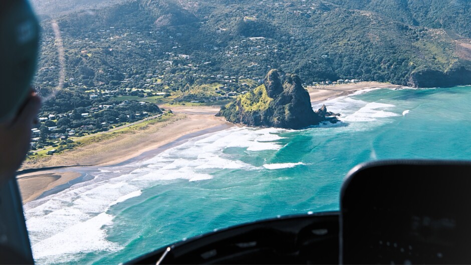 Soaking in the stunning views of Auckland’s rugged coastline and wild surf beaches from the sky