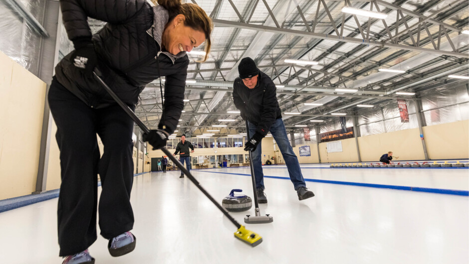 Enjoy a fun game of curling with the group