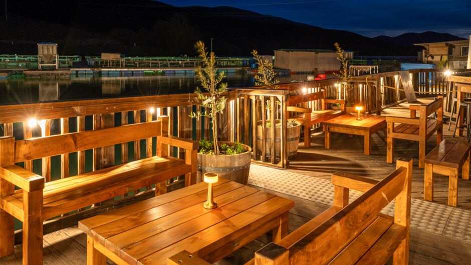 Deck with farm in the background during evening dining