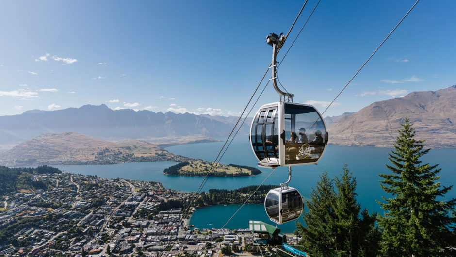 A Gondola cabin reaches the top of its journey high above Queenstown.