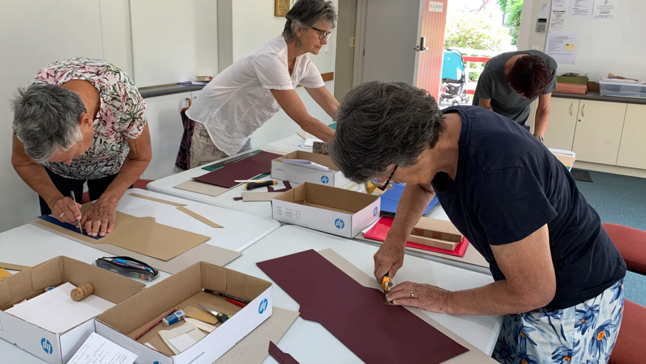 Students work on their unique creations at our Creative Bookbinding Workshop.