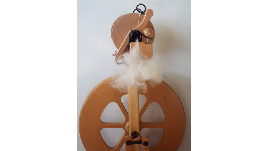 A spinning wheel used by students in our beginner Sheep to Skein: Learn to Spin Workshop.