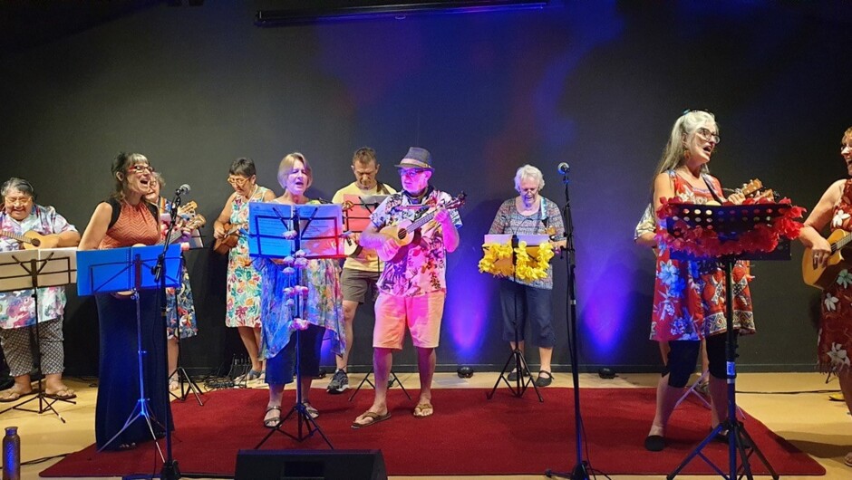 Ragtimers ukulele group performing in Whare Tapere at Raglan Old School Arts Centre