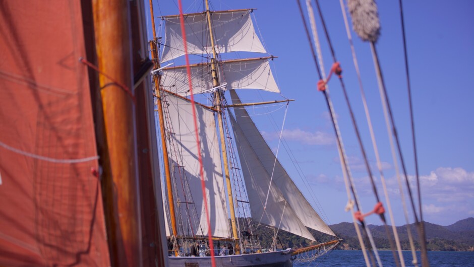 Tucker snapped under full sail from another local traditional vessel, Balaena.