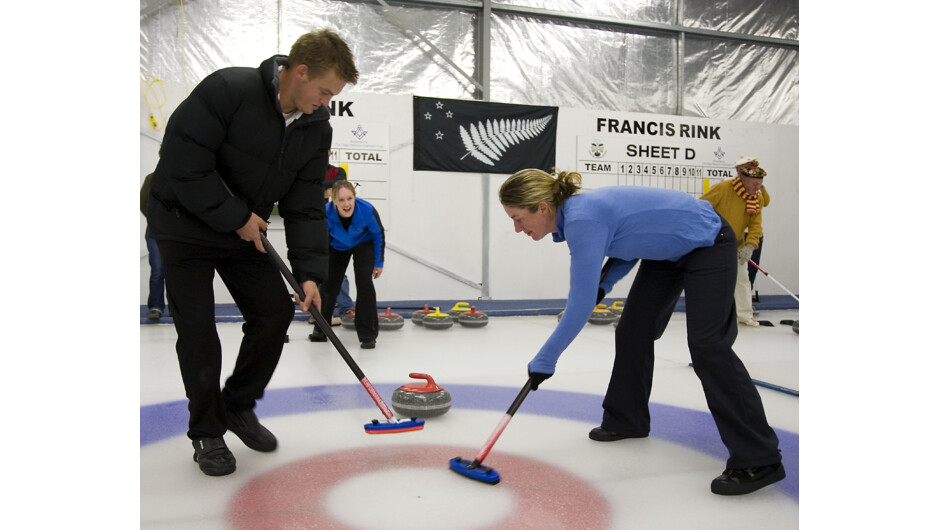 Sweeping the ice helps to speed up and smooth the ice for the curling stone.