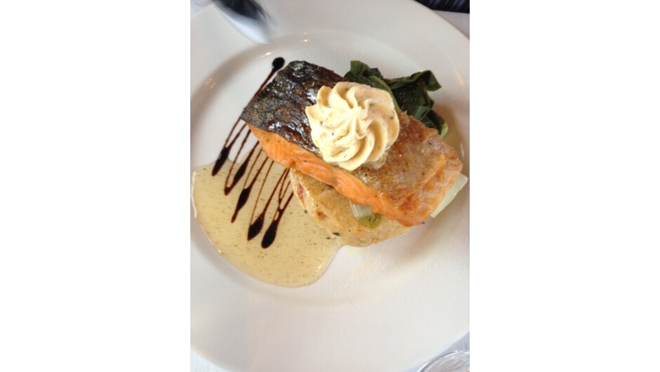 Main
Pan seared Akaroa Salmon fillet
 with a prawn risotto cake, wilted greens and kaffir lime ponzu glaze
topped with roasted crayfish butter
(GF)