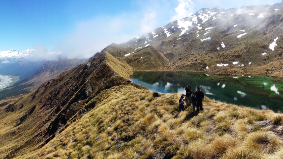 Pristine emerald lakes and panoramic views from the Alpine Lakes Heli Hike.